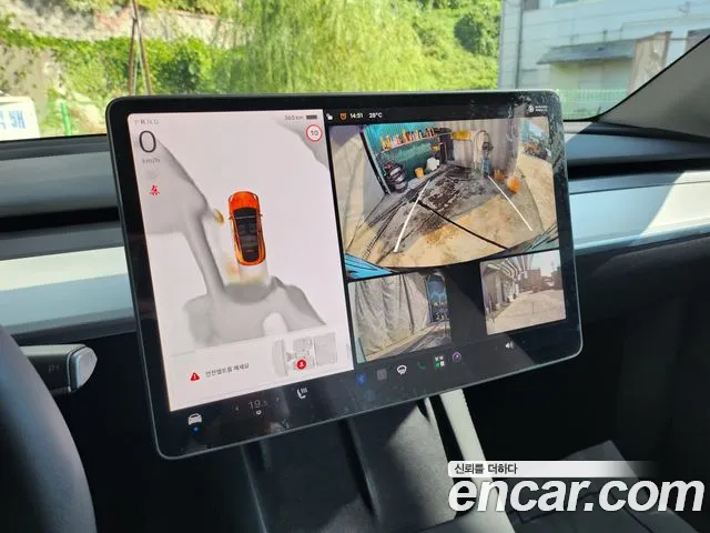 Tesla Model Y — Фото автомобиля 12
