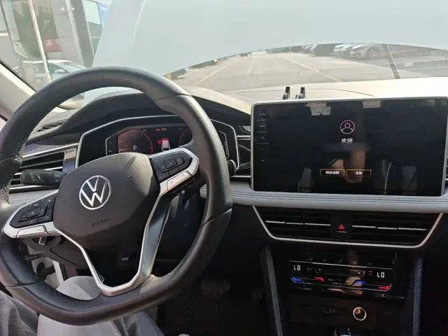 Volkswagen Tiguan L — Фото автомобиля 9