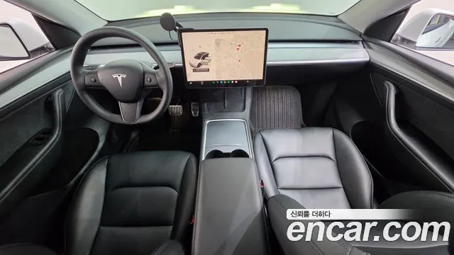 Tesla Model Y — Фото автомобиля 7