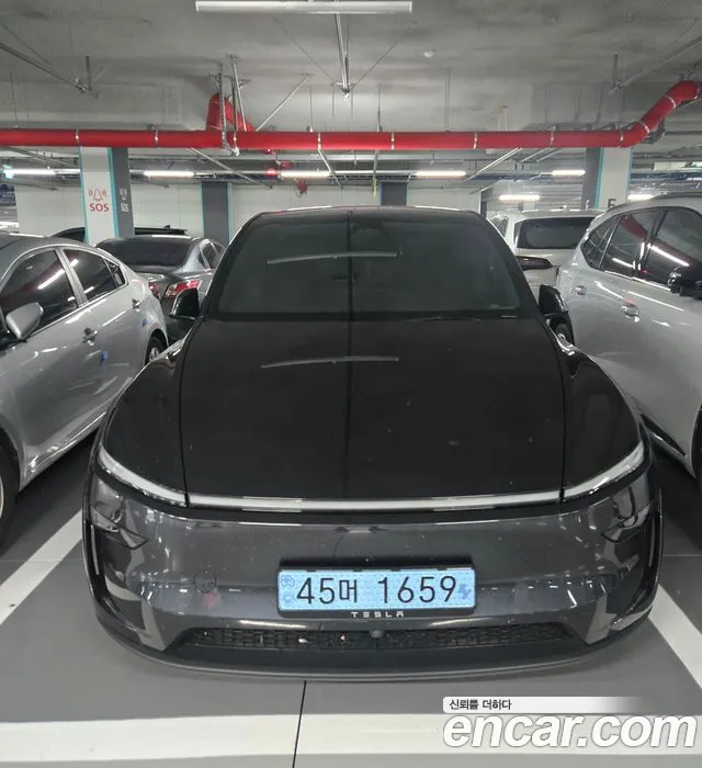 Tesla Model Y — Фото автомобиля 3
