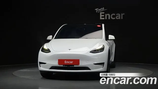 Tesla Model Y — Фото автомобиля 3