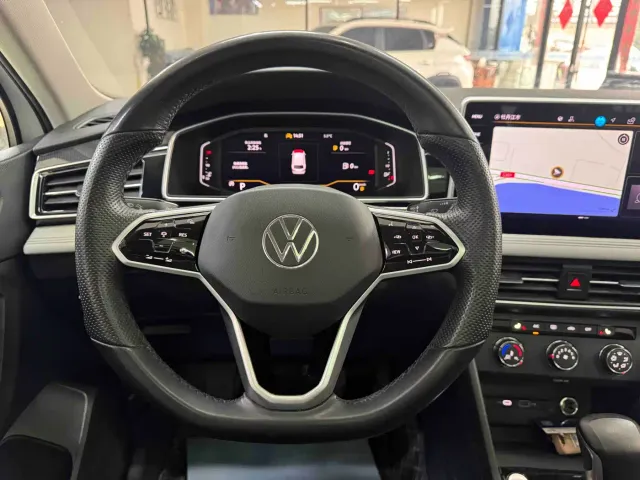 Volkswagen Tiguan L — Фото автомобиля 15