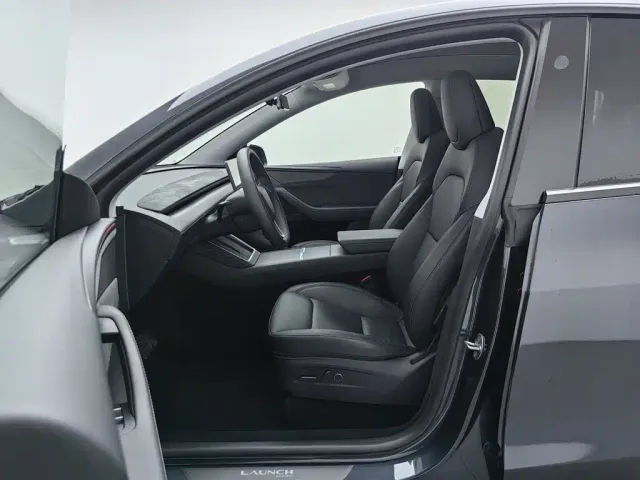 Tesla Model Y — Фото автомобиля 10