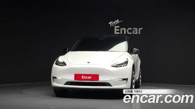 Tesla Model Y — Фото автомобиля 3