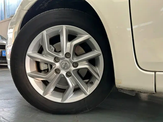 Nissan Tiida — Фото автомобиля 18