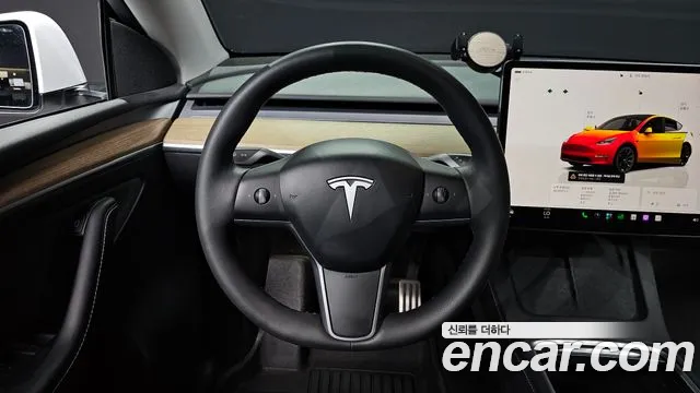 Tesla Model Y — Фото автомобиля 12
