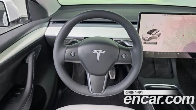 Tesla Model Y — Фото автомобиля 18