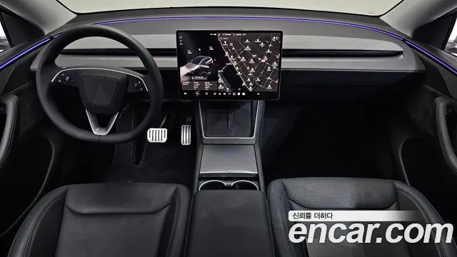 Tesla Model Y — Фото автомобиля 10