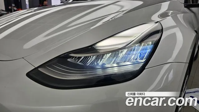 Tesla Model Y — Фото автомобиля 22