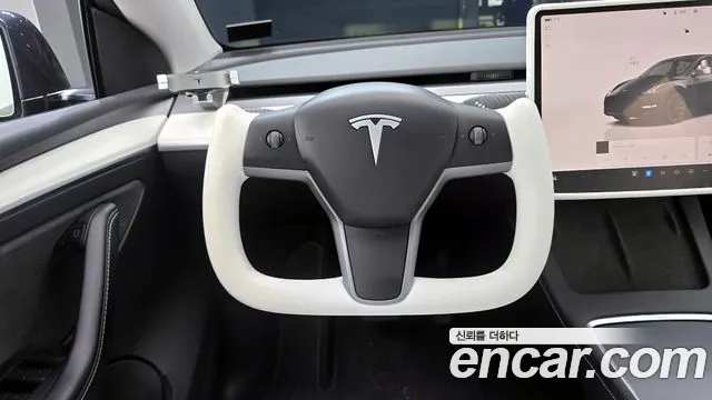 Tesla Model Y — Фото автомобиля 13