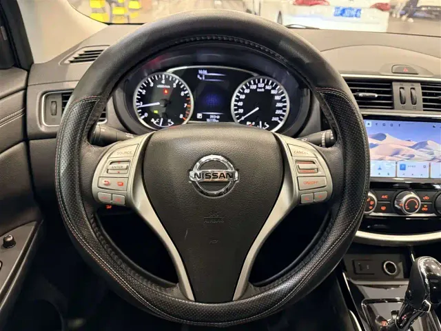 Nissan Tiida — Фото автомобиля 21