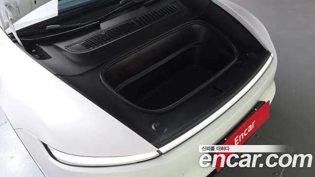 Tesla Model Y — Фото автомобиля 6