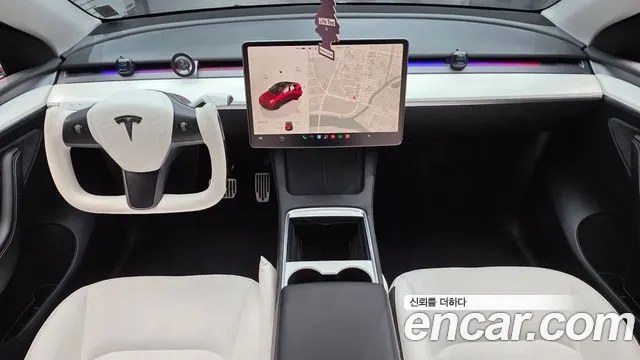Tesla Model Y — Фото автомобиля 10
