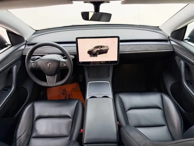 Tesla Model Y — Фото автомобиля 7