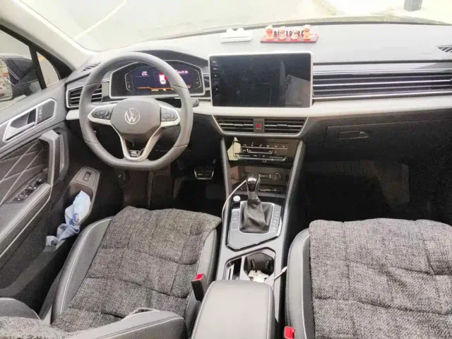 Volkswagen Tiguan L — Фото автомобиля 11