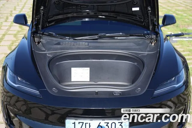 Tesla Model 3 — Фото автомобиля 15