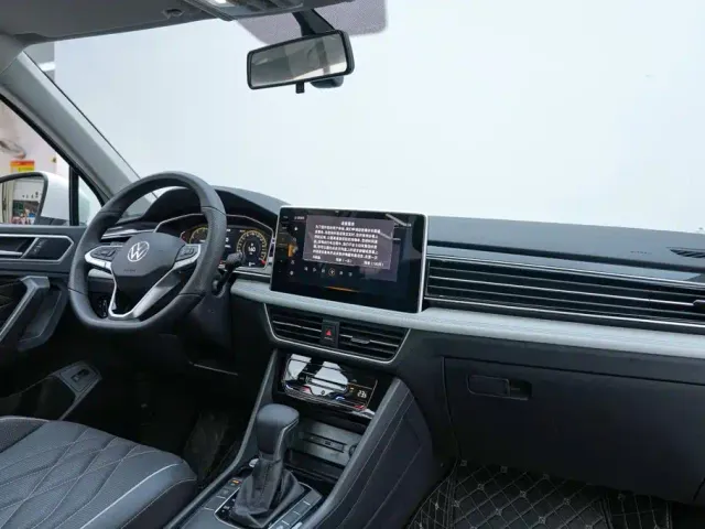 Volkswagen Tiguan L — Фото автомобиля 8