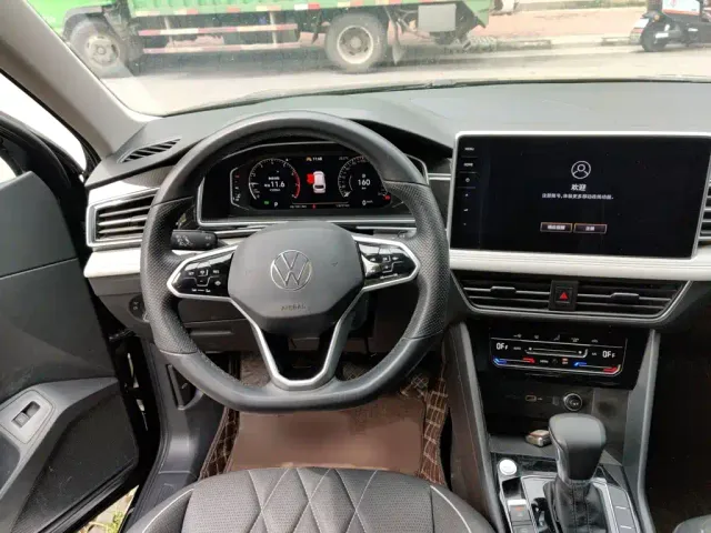 Volkswagen Tiguan L — Фото автомобиля 2