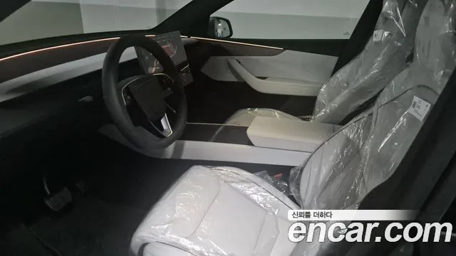 Tesla Model Y — Фото автомобиля 5