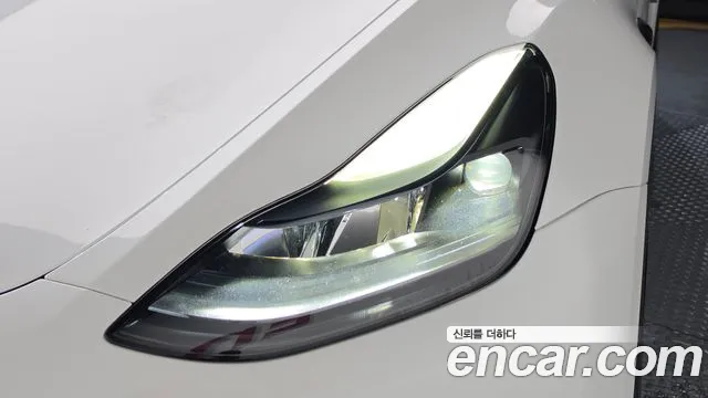 Tesla Model Y — Фото автомобиля 6