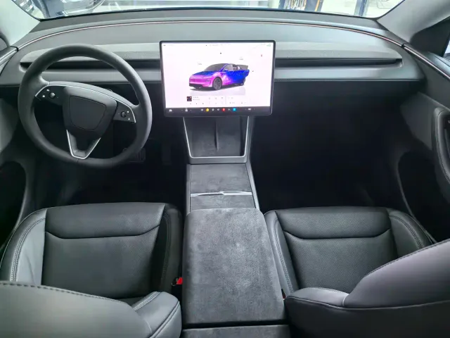 Tesla Model Y — Фото автомобиля 7