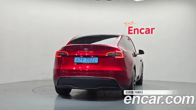 Tesla Model Y — Фото автомобиля 4