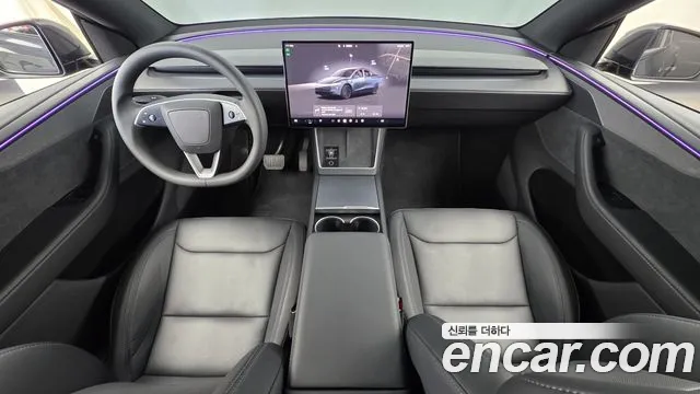 Tesla Model Y — Фото автомобиля 10