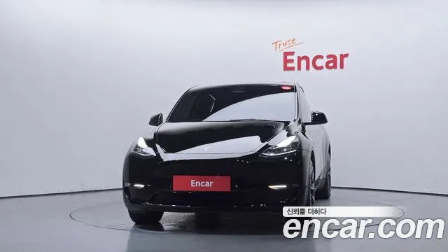 Tesla Model Y — Фото автомобиля 3