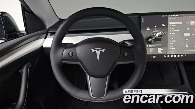 Tesla Model Y — Фото автомобиля 19