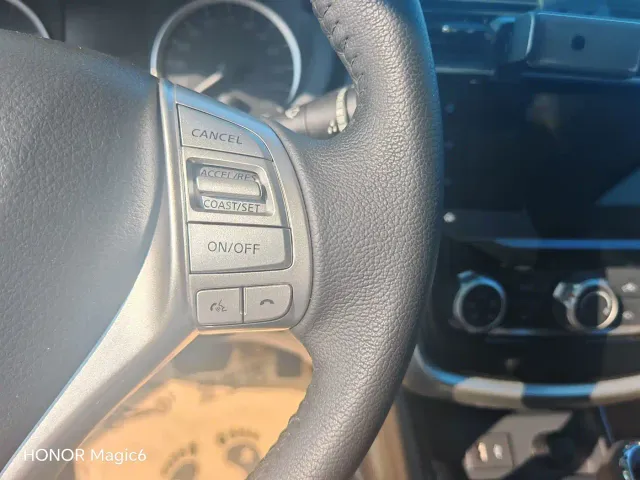 Nissan Tiida — Фото автомобиля 14