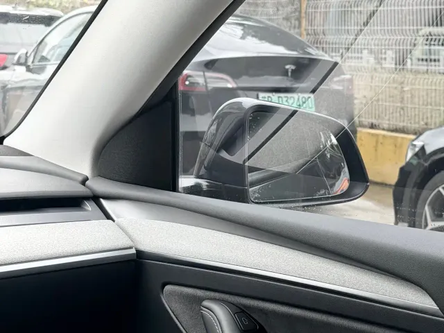 Tesla Model Y — Фото автомобиля 9