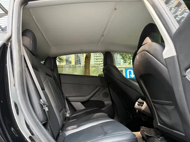 Tesla Model Y — Фото автомобиля 15