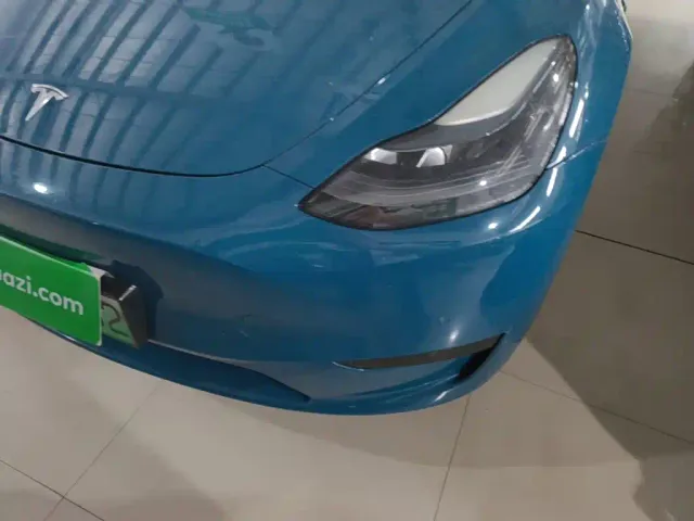 Tesla Model Y — Фото автомобиля 23