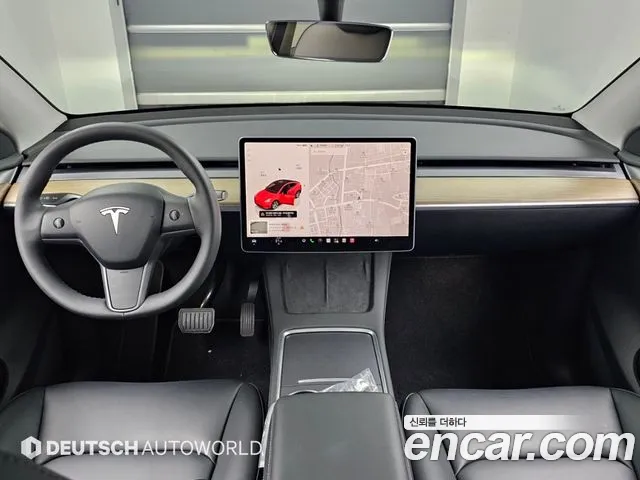 Tesla Model Y — Фото автомобиля 7