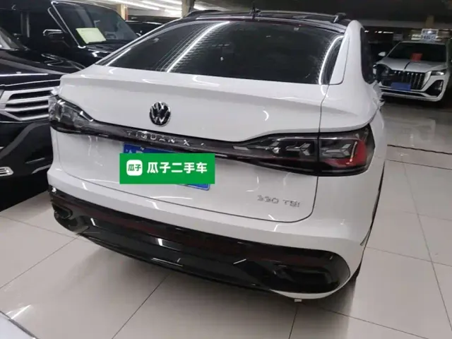 Volkswagen Tiguan X — Фото автомобиля 5