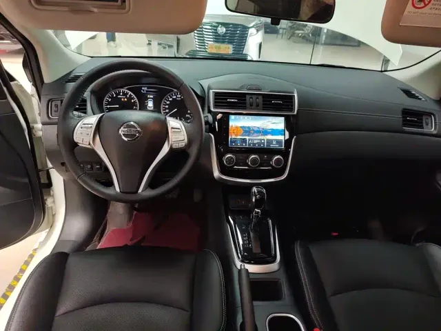 Nissan Tiida — Фото автомобиля 5