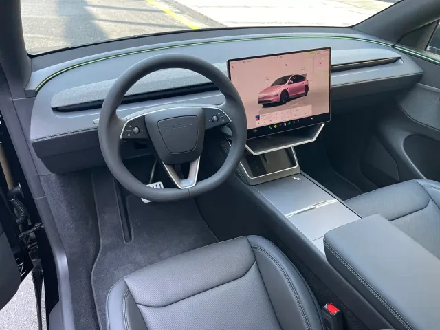 Tesla Model Y — Фото автомобиля 12