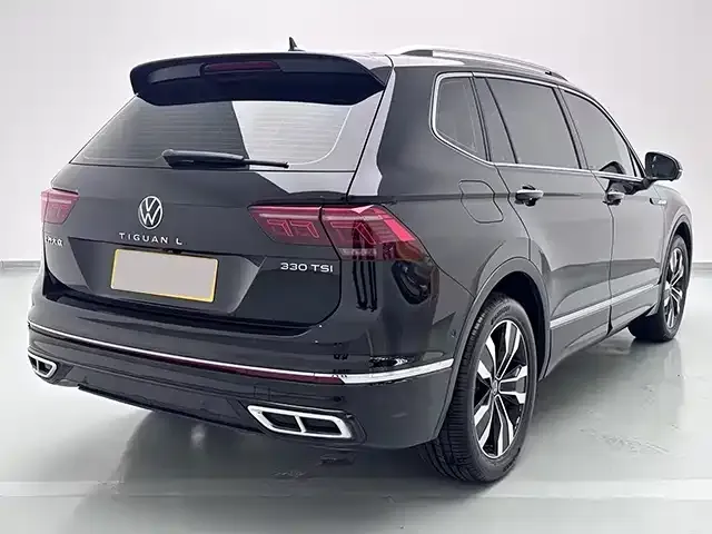 Volkswagen Tiguan L — Фото автомобиля 3