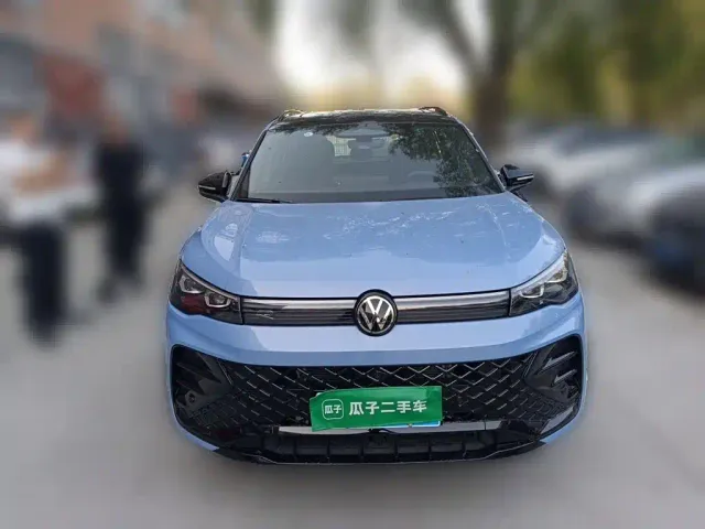 Volkswagen Tiguan L — Фото автомобиля 2