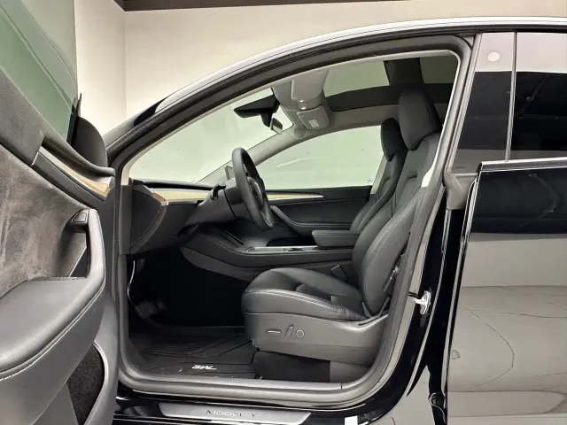 Tesla Model Y — Фото автомобиля 7