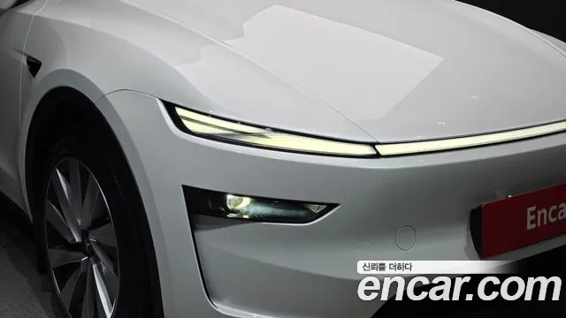 Tesla Model Y — Фото автомобиля 22
