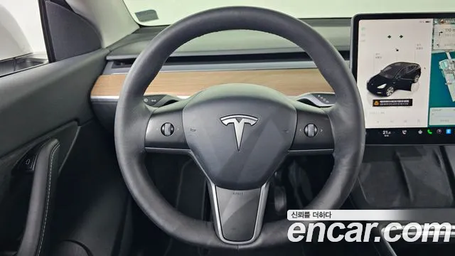 Tesla Model Y — Фото автомобиля 12