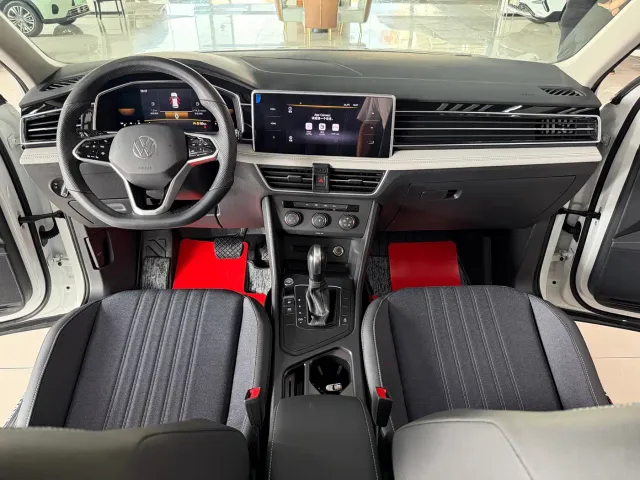 Volkswagen Tiguan L — Фото автомобиля 11