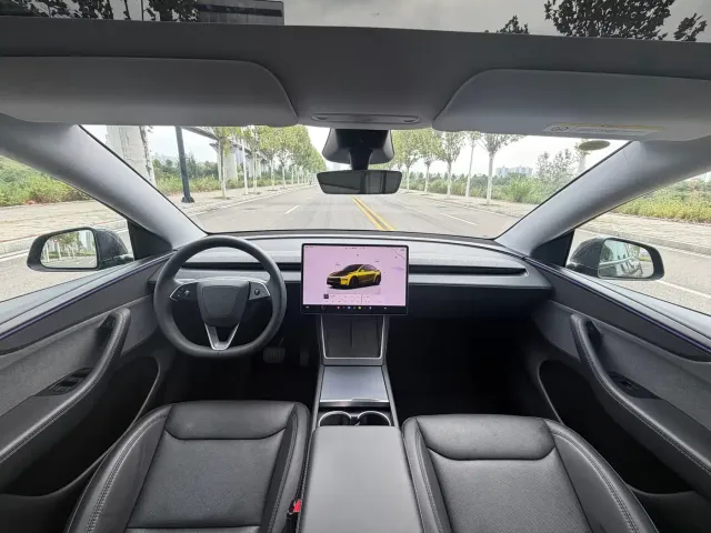 Tesla Model Y — Фото автомобиля 15