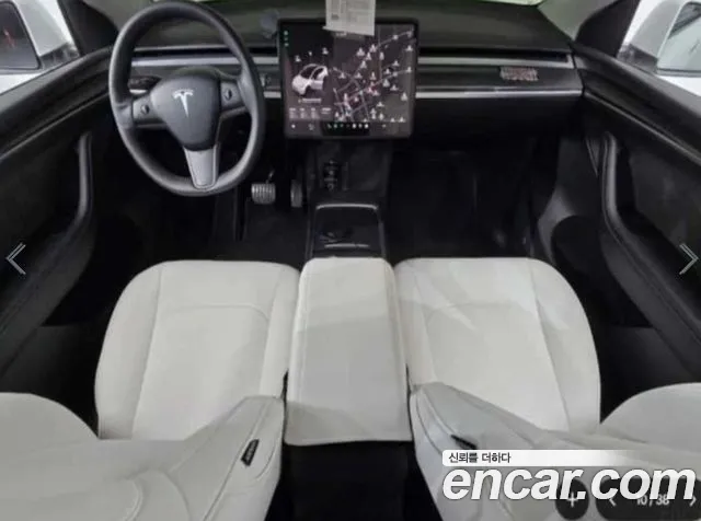 Tesla Model Y — Фото автомобиля 6