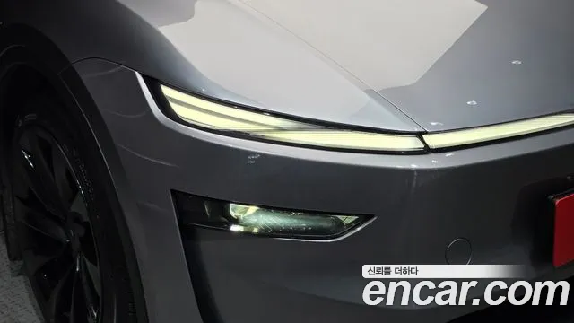 Tesla Model Y — Фото автомобиля 19