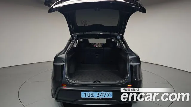 Tesla Model Y — Фото автомобиля 25