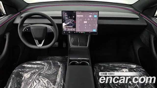 Tesla Model Y — Фото автомобиля 10
