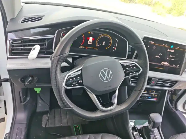 Volkswagen Tiguan L — Фото автомобиля 10