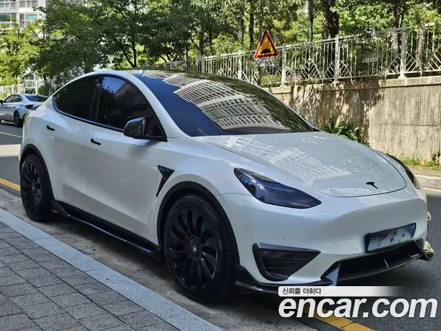 Tesla Model Y — Фото автомобиля 2
